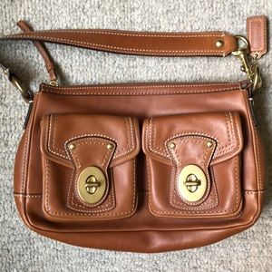 COACH women’s shoulder bag with front flat pockets